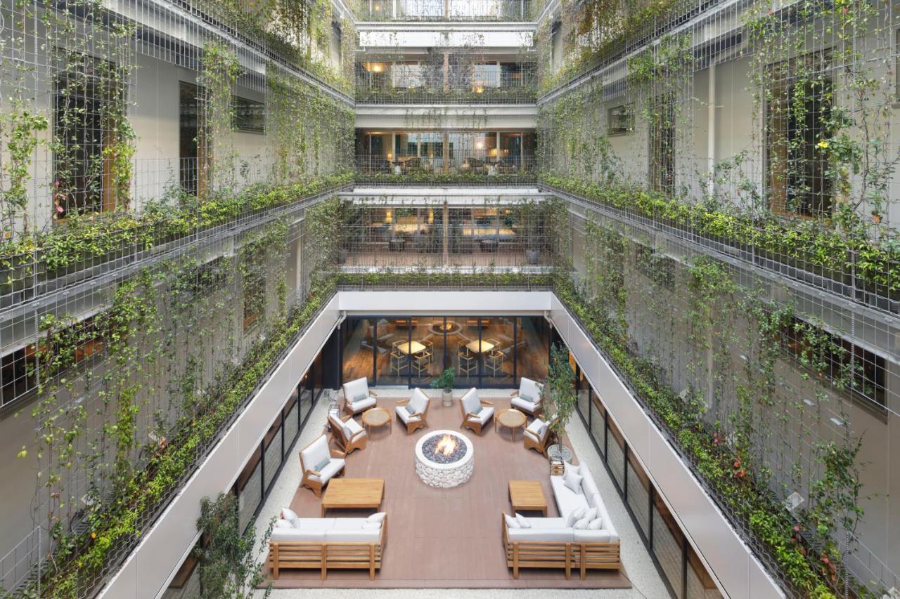 Good Nature Hotel Kiotó Kültér fotó The hotel's atrium
